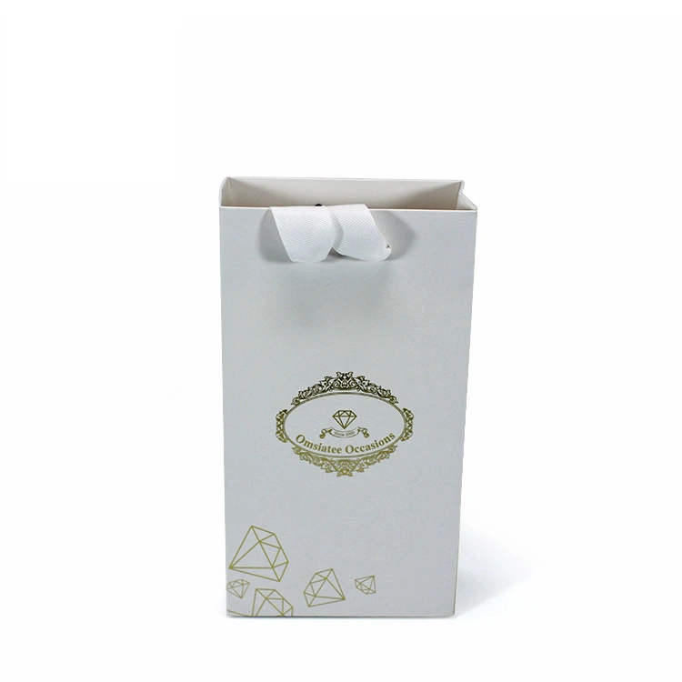 silver patterned embossed paper shopping bag