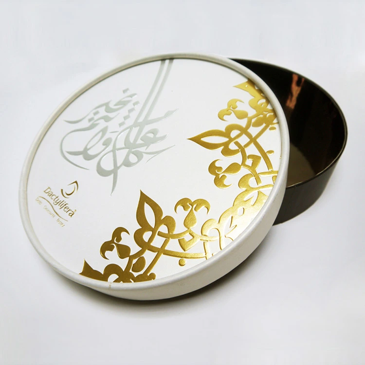 white and gold round cookie box